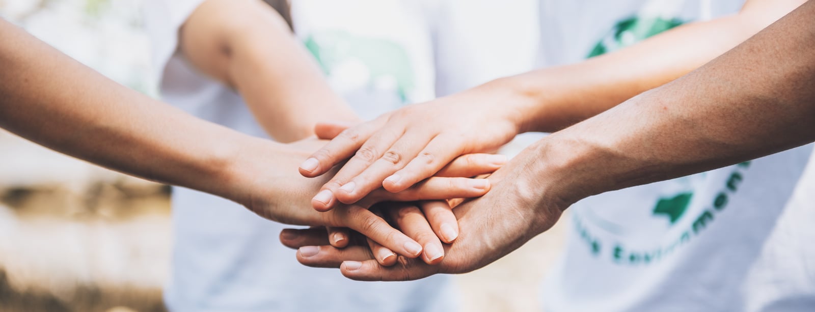 close-up-people-volunteer-teamwork-putting-finger-star-shapehands-togetherstack-handsunity-teamwork-world-environment-day.jpg